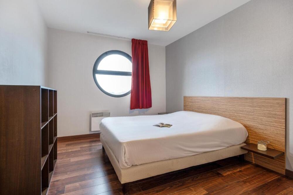 Foto de una habitación de Zenitude Hôtel - Résidences Nantes Métropole