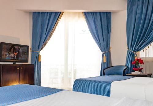 Foto de una habitación de Hotel White Valley Palace