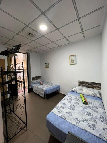 Foto de una habitación de Hostal Milan