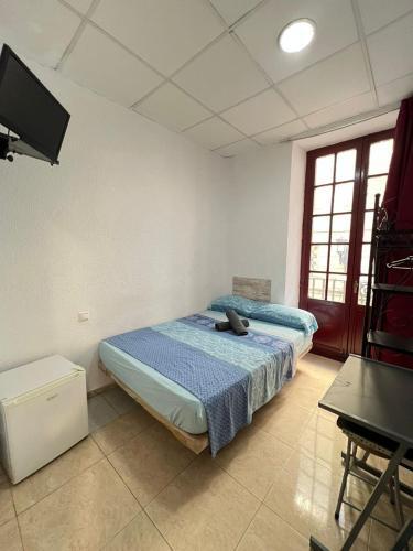 Foto de una habitación de Hostal Milan