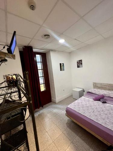 Foto de una habitación de Hostal Milan
