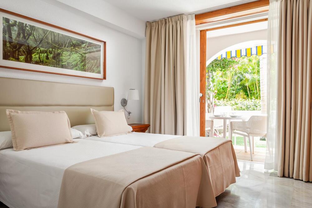 Foto de una habitación de Apartamentos Parque Santiago III y IV