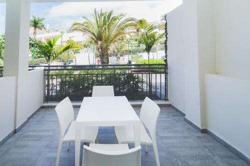 Foto de una habitación de Apartamentos Los Olivos Beach Resort