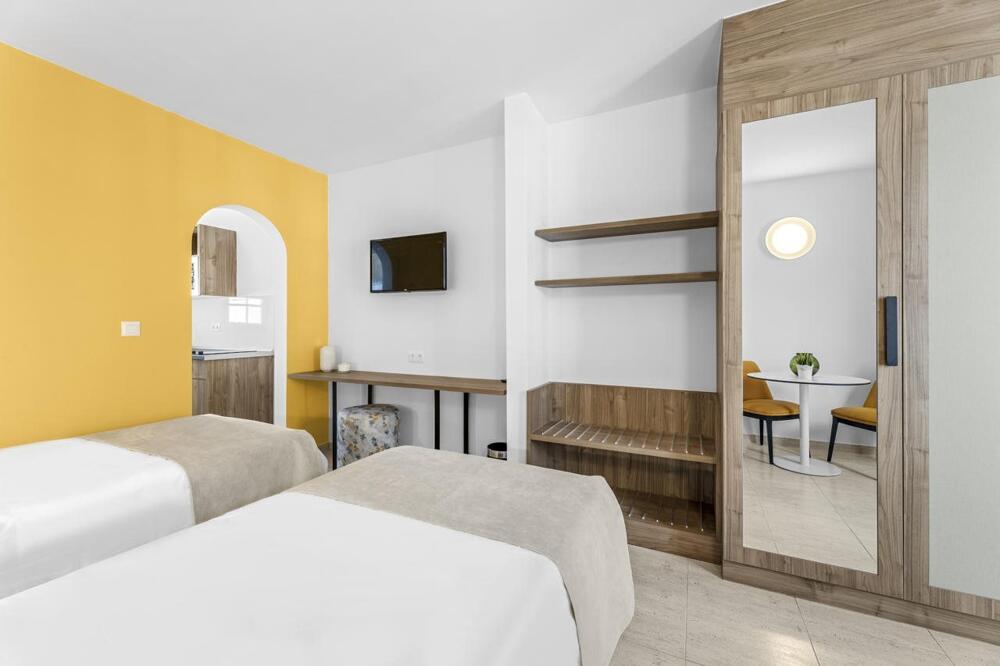 Foto de una habitación de Apartamentos Tropicana