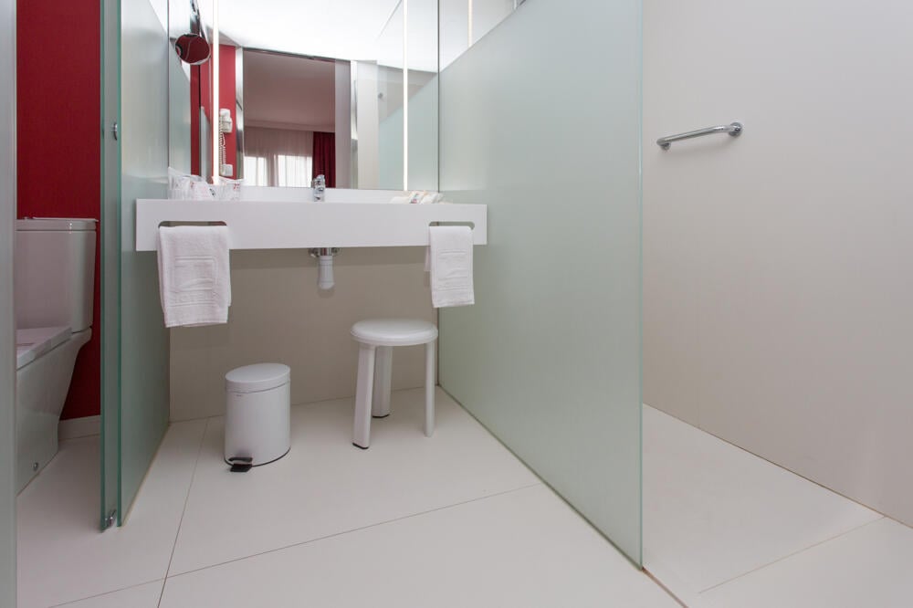 Foto del baño de Aparthotel Acuasol
