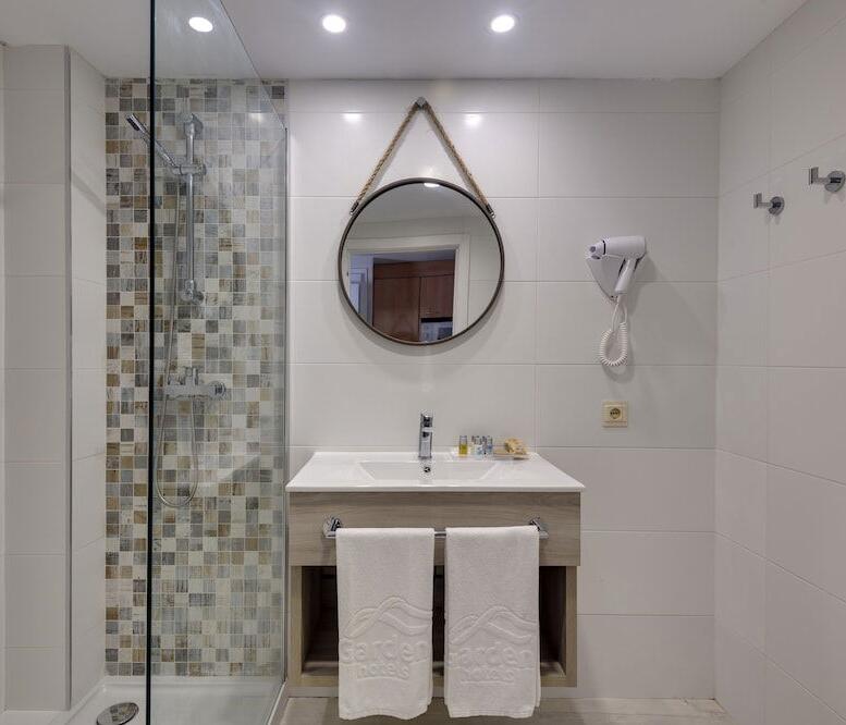 Foto del baño de Aparthotel Green Garden