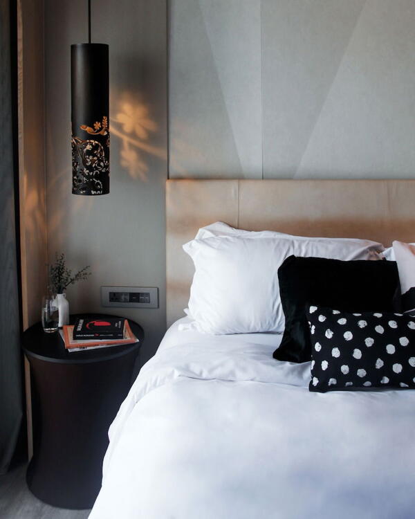 Foto de una habitación de Naumi Hotel