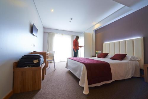 Foto de una habitación de Hotel Azinheira by RIDAN Hotels
