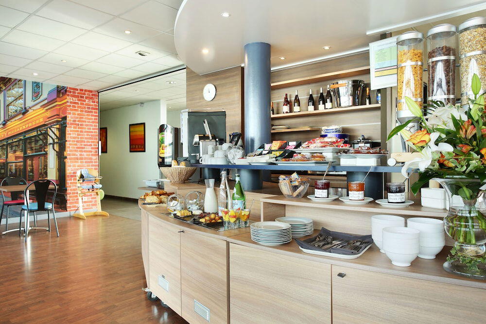 Foto de restauración de Hotel Suite-Home Orléans-Saran