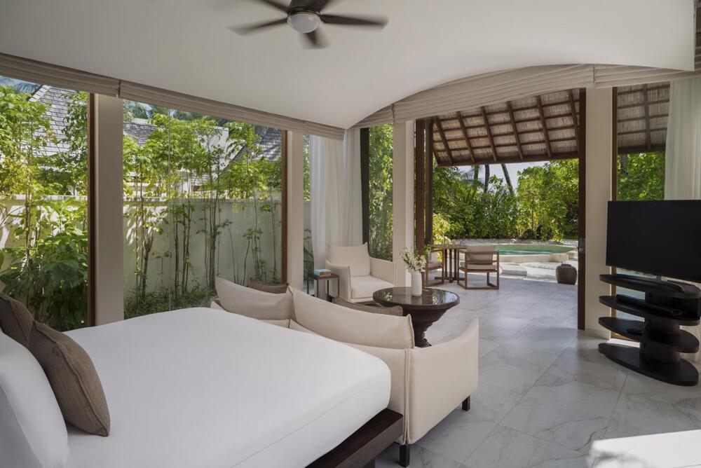Foto de una habitación de Complejo Conrad Maldives Rangali Island