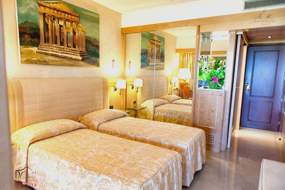 Foto de una habitación de Hotel Acacia Resort Parco Dei Leoni