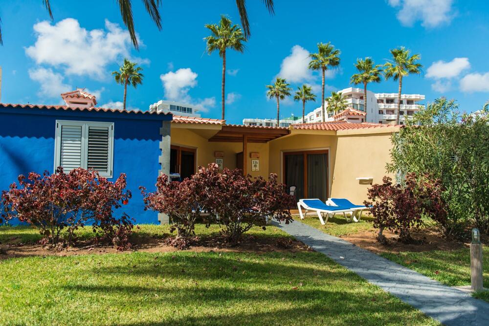 Foto de una habitación de HL Miraflor Suites Hotel