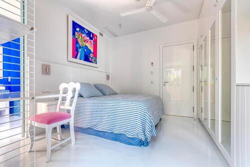 Foto de una habitación de The Pink Elephant Hotel