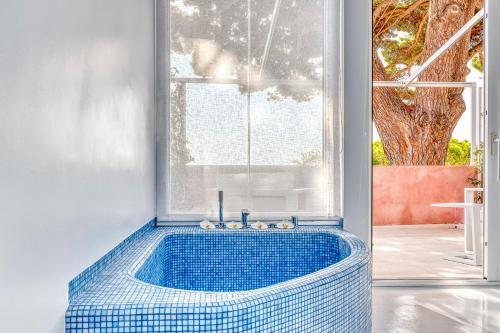 Foto de una habitación de The Pink Elephant Hotel