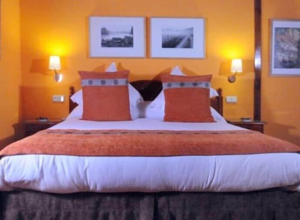 Foto de una habitación de Hotel Apartamentos Vilagaros