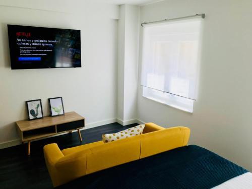 Foto de una habitación de Apartamentos Arriba by gaiarooms