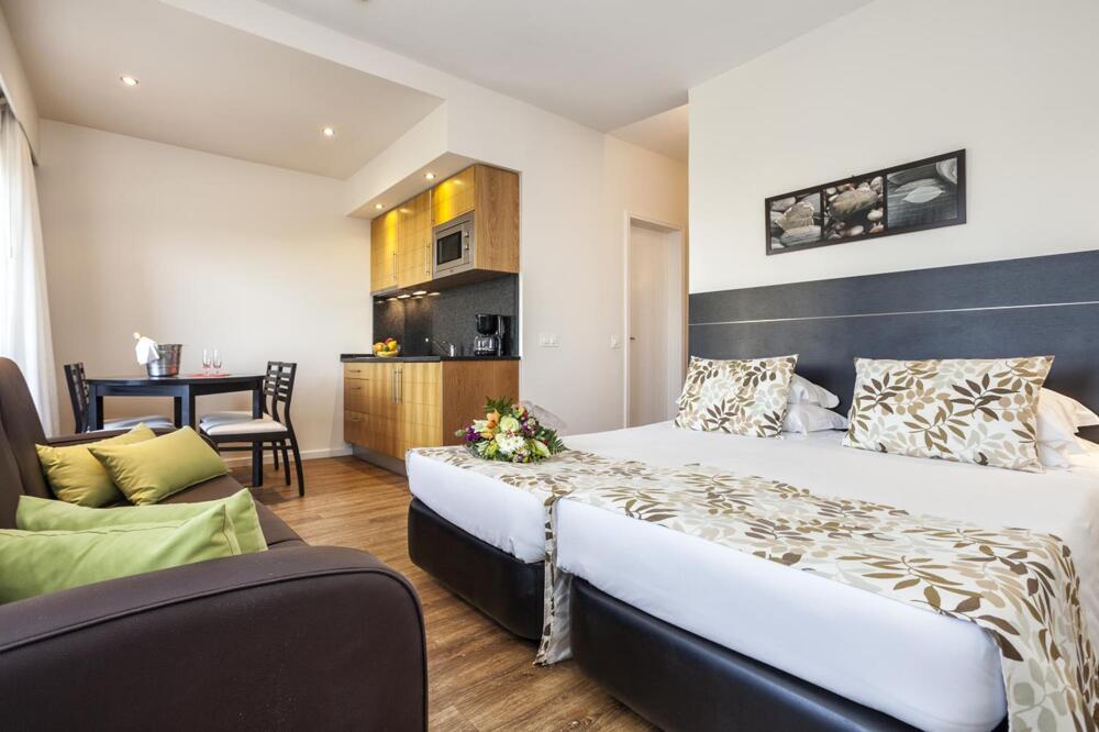 Foto de una habitación de Apartamentos Pestana Alvor Atlantico Residences Beach Suites