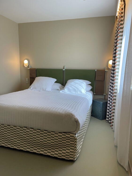 Foto de una habitación de Hotel des Victoires - Restaurant