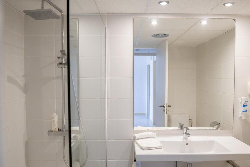 Foto del baño de Roc Portonova Apartaments