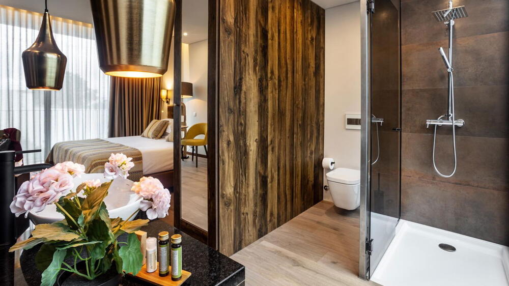 Foto del baño de Évora O Cante Hotel