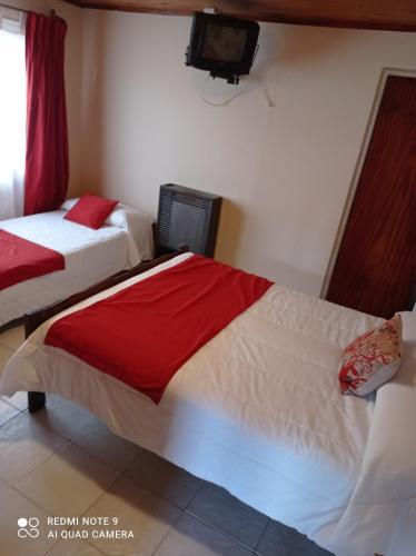 Foto de una habitación de Calafate Viejo Hostel