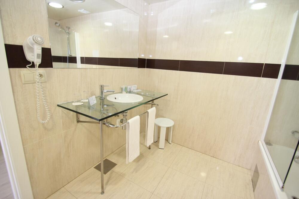 Foto del baño de Aparthotel Acualandia