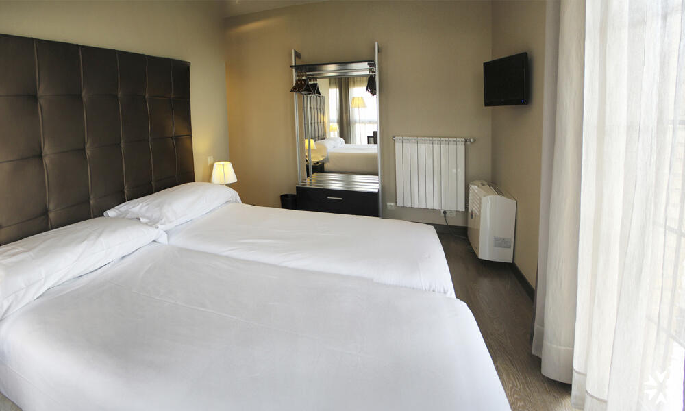 Foto de una habitación de Pamplona Catedral Hotel