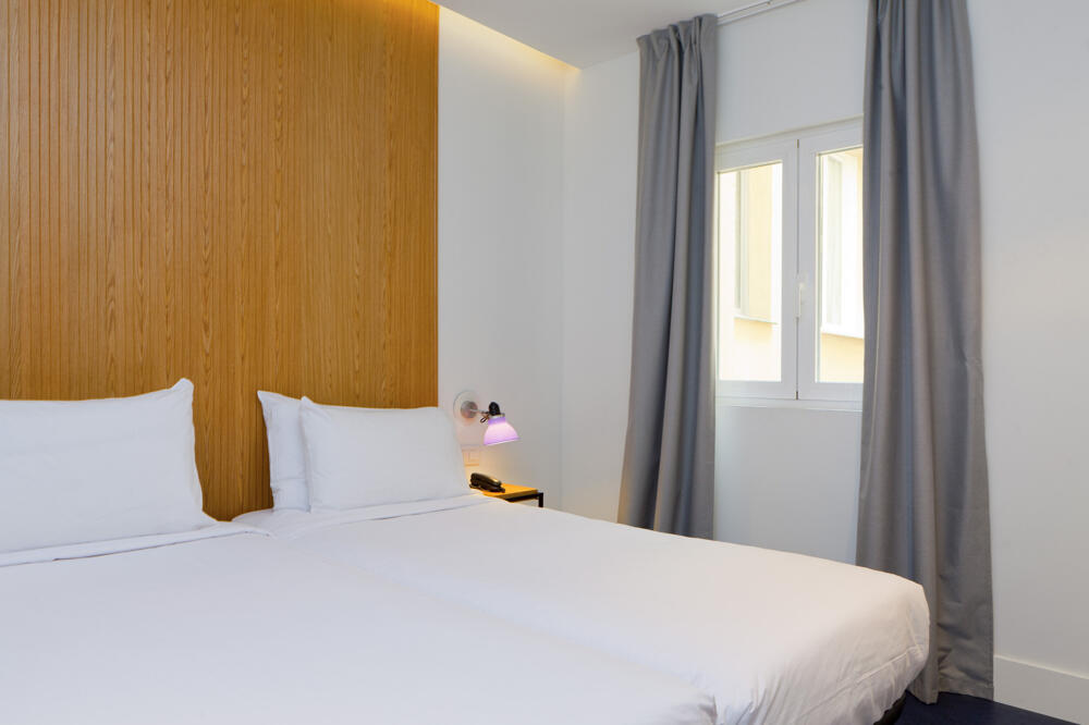 Foto de una habitación de Hostal SLEEP&amp;#039;N Atocha - B Corp Certified