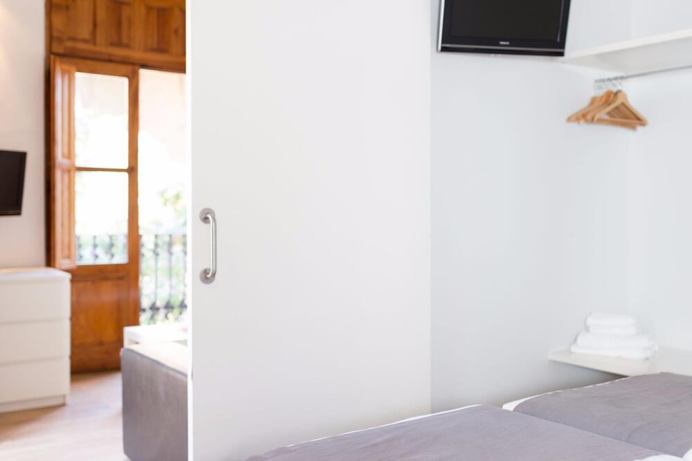 Foto de una habitación de Apartamentos Valenciaflats Torres de Serrano