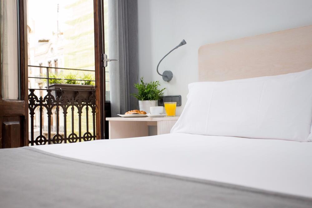 Foto de una habitación de Hostal Oliveira Rooms