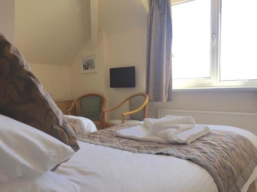 Foto de una habitación de Membly Hall Hotel