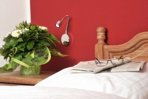 Foto de una habitación de Stadthotel Langenfeld