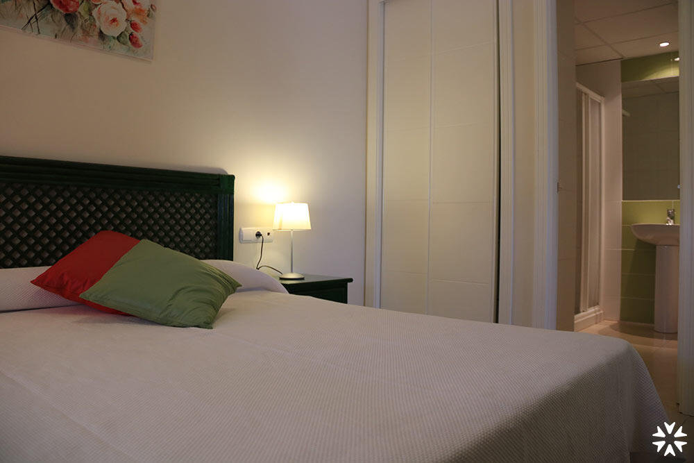 Foto de una habitación de Apartamentos Larimar Unitursa