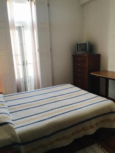 Foto de una habitación de Alojamento Baixa Mar