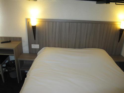 Foto de una habitación de Hotel Initial by Balladins Béthune