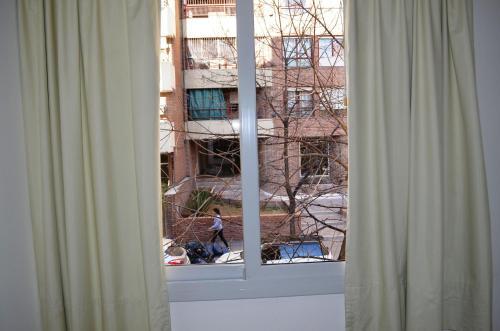 Foto de una habitación de Alquileres Vacacionales Excelentes departamentos ubicados en Nueva Cordoba