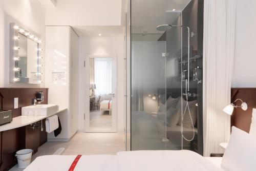 Foto del baño de Ruby Leni Hotel Dusseldorf