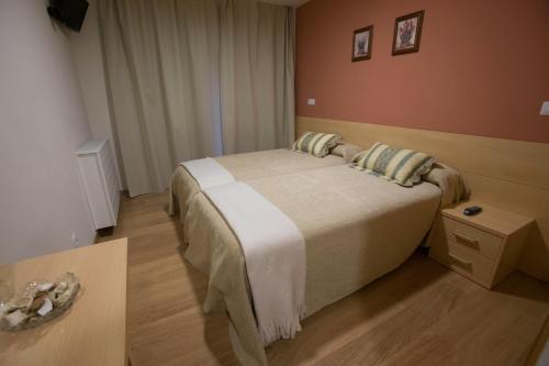 Foto de una habitación de Hotel Alcamino