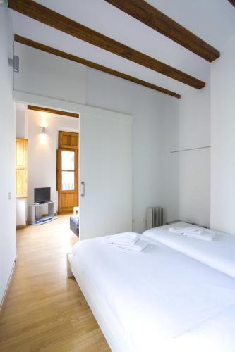 Foto de una habitación de Apartamentos Valenciaflats Torres de Serrano