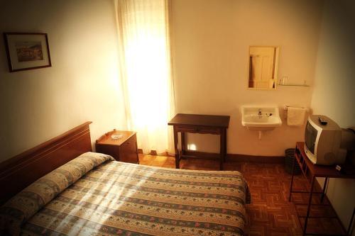 Foto de una habitación de Pension Central