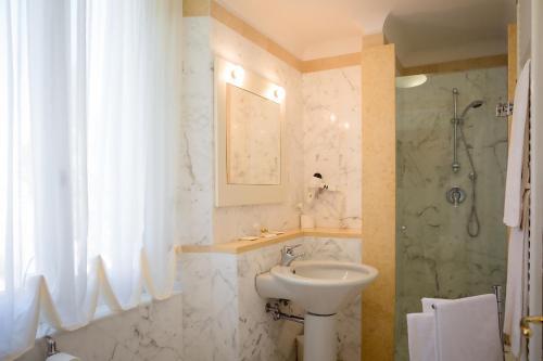 Foto del baño de Aparthotel Palazzo La Fenice