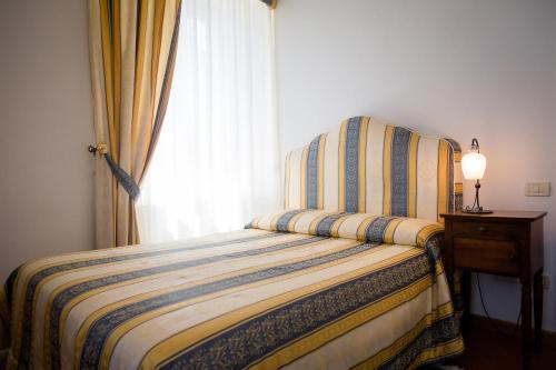 Foto de una habitación de Aparthotel Palazzo La Fenice