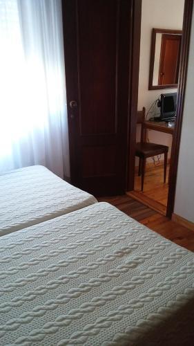 Foto de una habitación de Hotel El Sueve