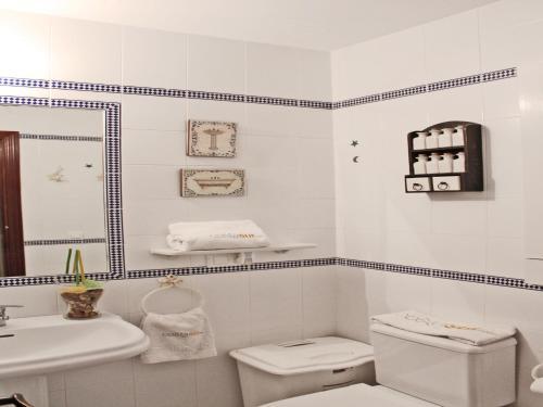 Foto del baño de Apartamento El Atardecer cerca del mar