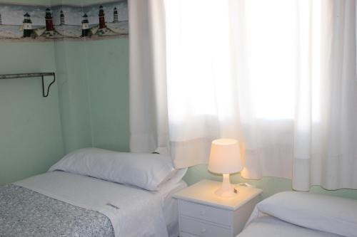 Foto de una habitación de Apartamento El Atardecer cerca del mar