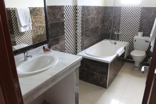 Foto del baño de Hotel Cafe Verdi