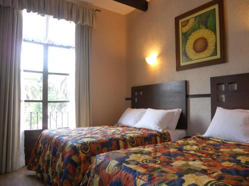 Foto de una habitación de Hotel Royalty Puebla