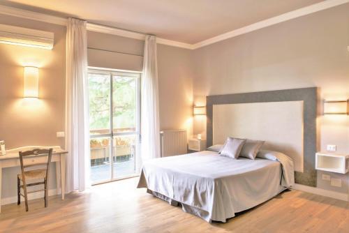 Foto de una habitación de Hotel La Genziana