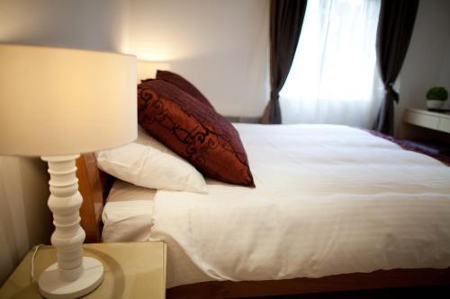 Foto de una habitación de Aparthotel Welcome Inn Victoria