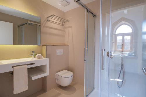 Foto del baño de Hotel Can Mostatxins